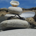 pebbles balanced on a stone